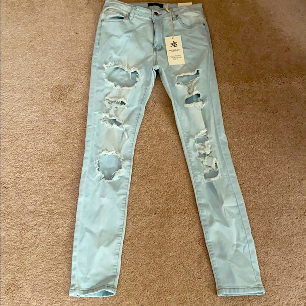Fashion Nova Light Blue ripped Skinny Jeans